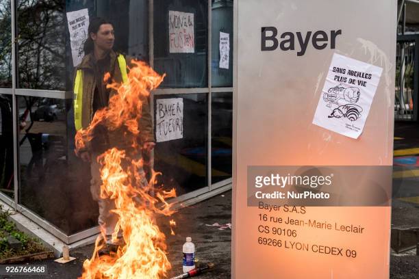 Demonstration in front of the headquarters of the Bayer company against the merger with the Monsanto company in Lyon, France, on March 3rd, 2018.
