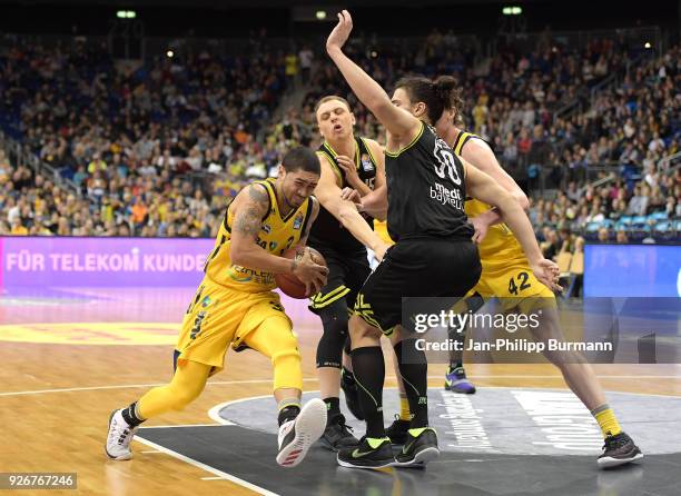 Peyton Siva of Alba Berlin, Robin Amaize, Assem Marei of medi Bayreuth and Dennis Clifford of Alba Berlin during the easyCredit BBL game between Alba...