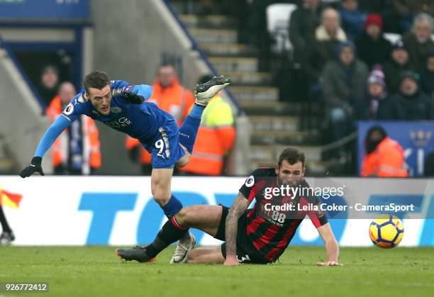 Jamie Vardy of Leicester City tackled by Steve Cook of Bournemouth during the Premier League match between Leicester City and AFC Bournemouth at The...