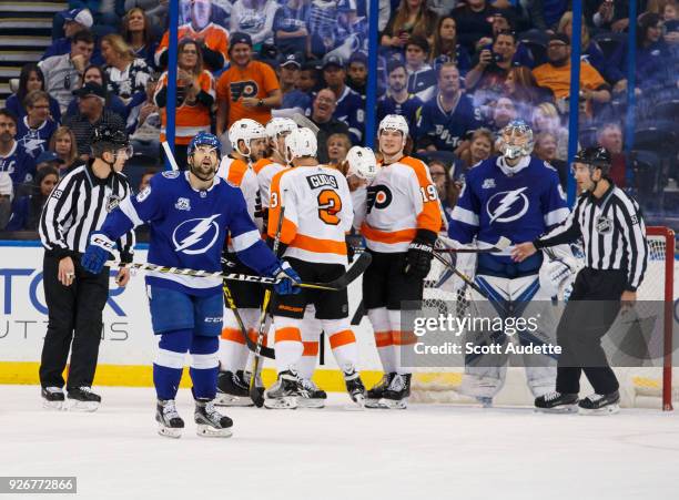 Goalie Andrei Vasilevskiy and Cory Conacher of the Tampa Bay Lightning react to giving up a goal against the Philadelphia Flyers during the first...