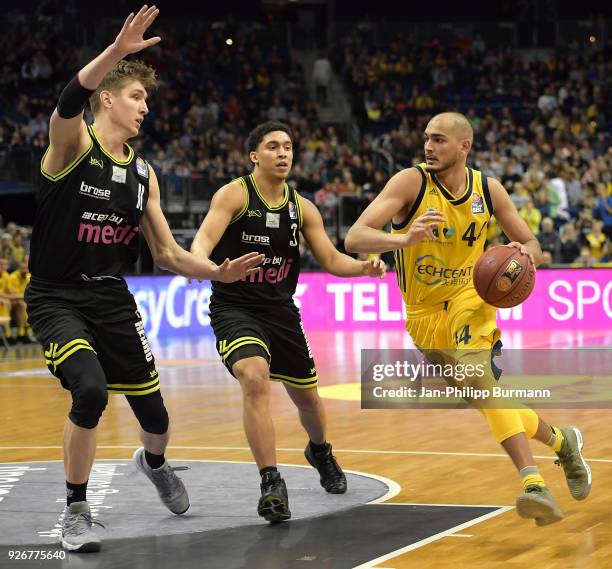 Andreas Seiferth, James Robinson of medi Bayreuth and Stefan Peno of Alba Berlin during the easyCredit BBL game between Alba Berlin and medi Bayreuth...