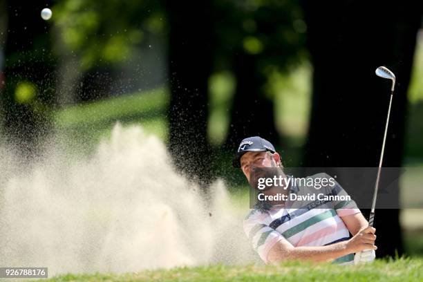 Marc Leishman of Australia plays his second shot on the par 3, third hole during the third round of the World Golf Championships-Mexico Championship...