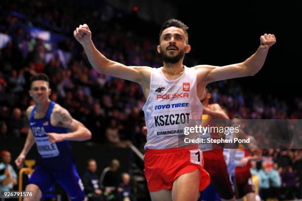 Adam Kszczot of Poland celebrates winning the 800 Metres Mens Final during the IAAF World Indoor Championships on Day Three at Arena Birmingham on...