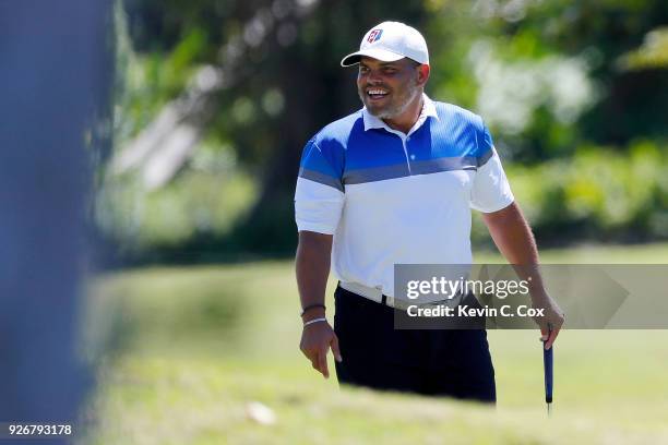 Major League Baseball Hall of Famer Ivan "Pudge" Rodriguez looks on from the 15th hole during the second day of the Puerto Rico Open Charity Pro-Am...