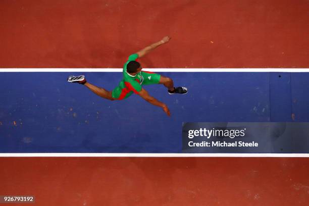 Nelson Evora of Portugal competes in the Triple Jump Mens Final during the IAAF World Indoor Championships on Day Three at Arena Birmingham on March...