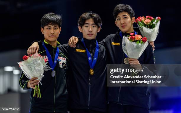 Medal ceremony with second place silver winning Kazuki Yoshinaga of Japan, first place gold winning Kyung Hwan Hong of Korea and third place bronze...
