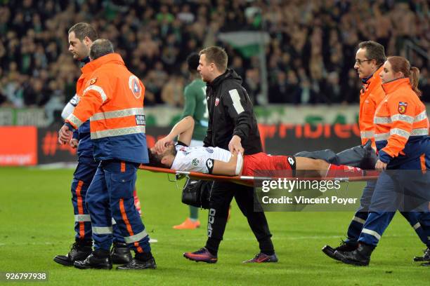 Mehdi ABEID is injured during the Ligue 1 match between AS Saint-Etienne and Dijon FCO at Stade Geoffroy-Guichard on March 3, 2018 in Saint-Etienne, .