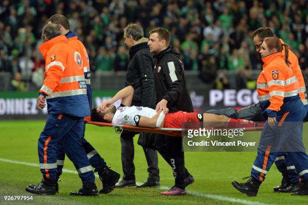 Mehdi ABEID is injured during the Ligue 1 match between AS Saint-Etienne and Dijon FCO at Stade Geoffroy-Guichard on March 3, 2018 in Saint-Etienne, .