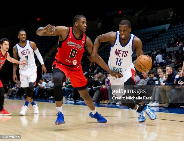 Jaylen Johnson of the Windy City Bulls defends against Isaiah Whitehead of the Long Island Nets during an NBA G-League game on March 2, 2018 at NYCB...