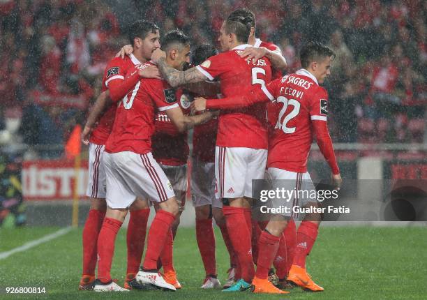 Benfica forward Jonas from Brazil celebrates with teammates after scoring a goal during the Primeira Liga match between SL Benfica and CS Maritimo at...