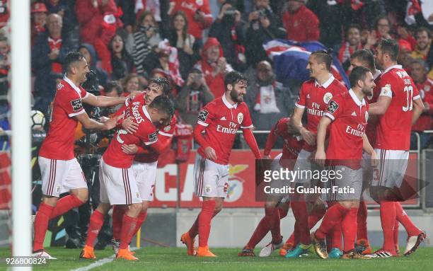 Benfica defender Alejandro Grimaldo from Spain celebrates with teammates after scoring a goal during the Primeira Liga match between SL Benfica and...