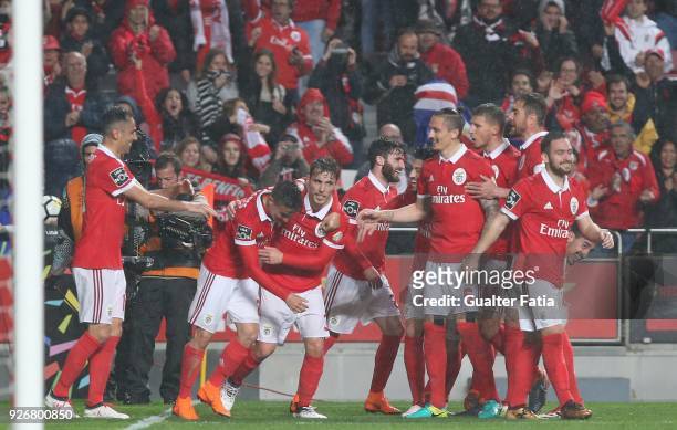 Benfica defender Alejandro Grimaldo from Spain celebrates with teammates after scoring a goal during the Primeira Liga match between SL Benfica and...