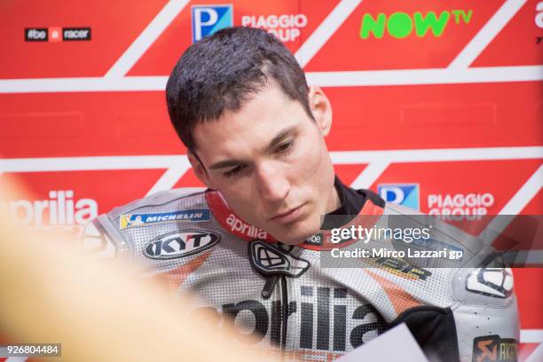 Aleix Espargaro of Spain and Aprilia Racing Team Gresini looks on in box during the Moto GP Testing - Qatar at Losail Circuit on March 3, 2018 in...