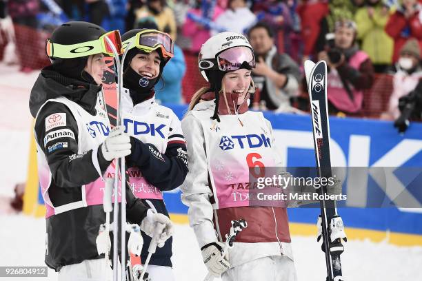 Keaton McCargo of the United States, Perrine Laffont of France and Justine Dufour-Lapointe of Canada celebrate during day one of the FIS Freestyle...