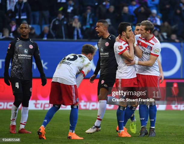 Filip Kostic of Hamburg reacts after his penalty kick was saved during the Bundesliga match between Hamburger SV and 1. FSV Mainz 05 at...