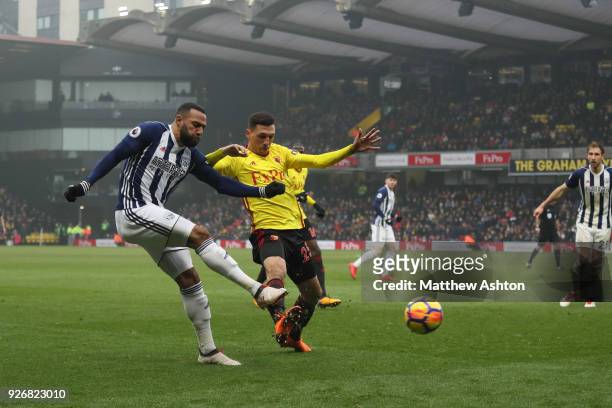 Matt Phillips of West Bromwich Albion and Jose Holebas of Watford during in the Premier League match between Watford and West Bromwich Albion at...