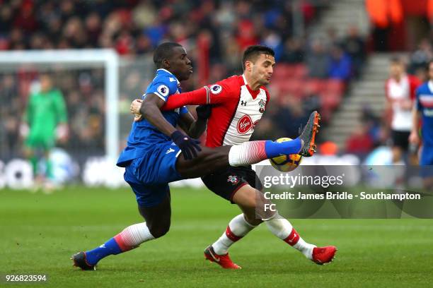 Dusan Tadic of Southampton FC takes on Kurt Zouma during the Premier League match between Southampton and Stoke City at St Mary's Stadium on March 3,...