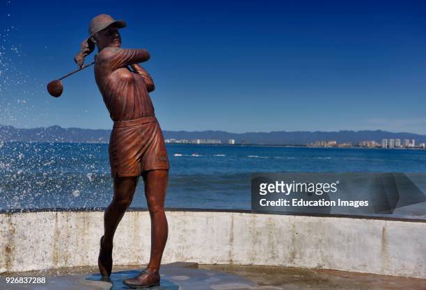 Lorena Ochoa female golfer Statue on Malecon of Puerto Vallarta Mexico.