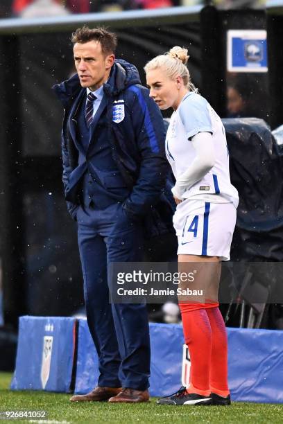 Manager Phil Neville of England gives instructions to Alex Greenwood of England during a game against France on March 1, 2018 at MAPFRE Stadium in...