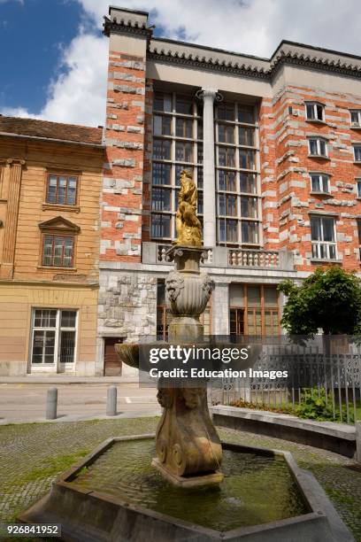 Neptune fountain by Janez Kumersteiner 1675 at SAZU Geographical Museum across from the National and University Library of Slovenia Ljubljana.