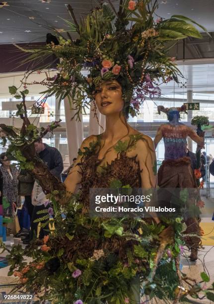 Performers dressed as Flares and Pan at Pampilhosa da Serra stand in BTL "Bolsa de Turismo Lisboa" trade fair on March 03, 2018 in Lisbon, Portugal....