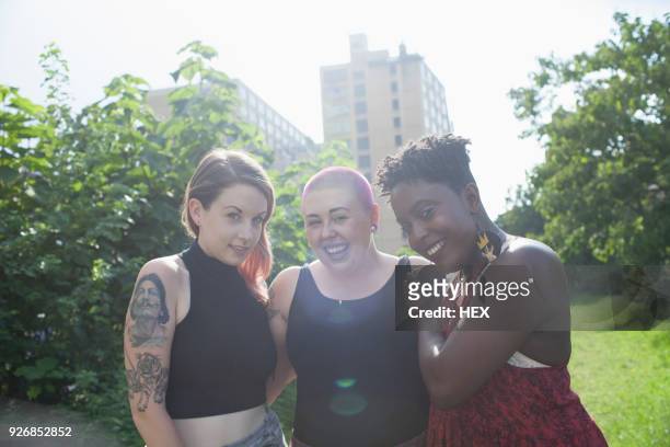 three young women at a park - the big friendly giant film 2016 stock-fotos und bilder