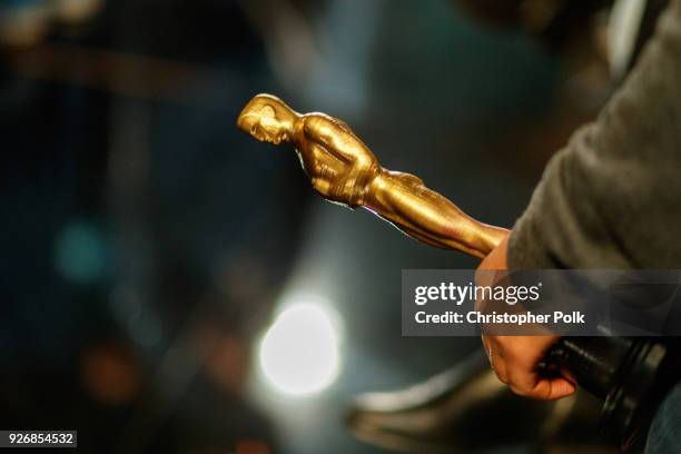 An Oscar Prop is held by a stand in Actor backstage during rehersals for the 90th Oscars at The Dolby Theatre on March 3, 2018 in Hollywood,...