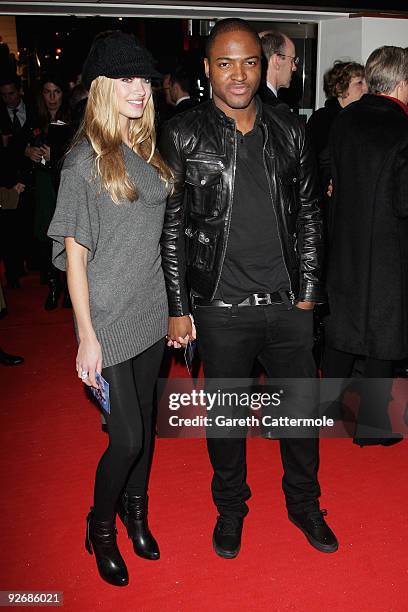 Taio Cruz and guest arrive for the World Film Premiere of Disney's 'A Christmas Carol' at the Odeon Leicester Square on November 3, 2009 in London,...