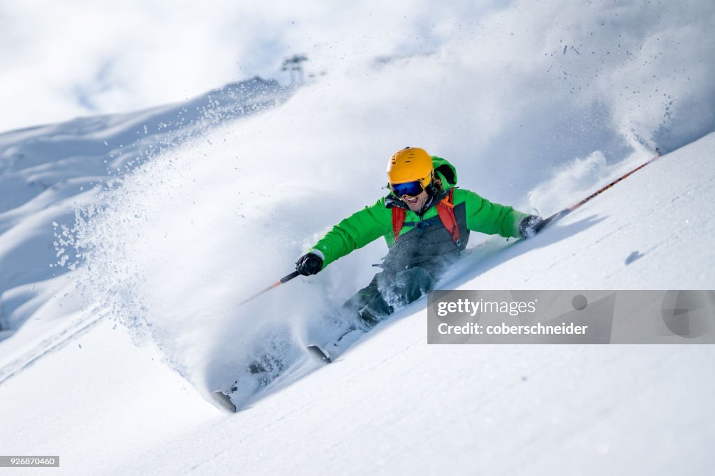 Man skiing in powder snow, Kitzsteinhorn, Salzburg, Austria