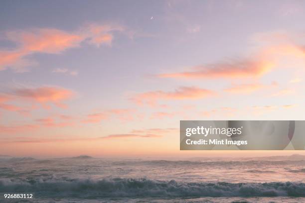 seascape with cloudy sky at sunset. - california seascape stock pictures, royalty-free photos & images