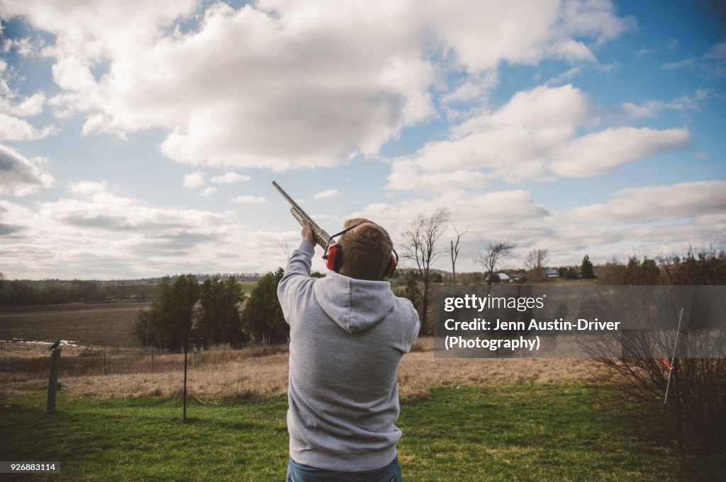 Man skeet shooting