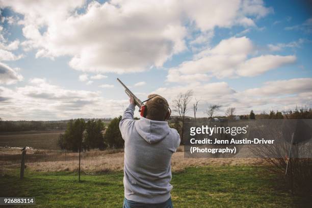 man skeet shooting - shotgun stock pictures, royalty-free photos & images