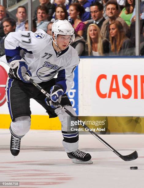 Victor Hedman of the Tampa Bay Lightning skates the puck up ice during game action against the Toronto Maple Leafs November 3, 2009 at the Air Canada...