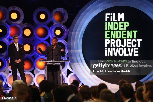 Film Independent President Josh Welsh looks on as producer Effie Brown speaks onstage during the 2018 Film Independent Spirit Awards on March 3, 2018...