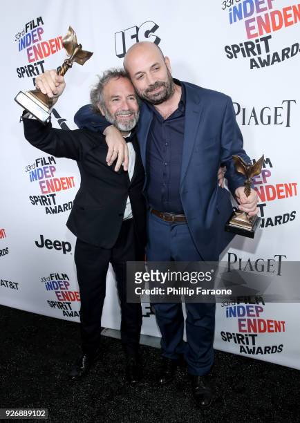Producer Pedro Hernandez Santos and director Antonio Mendez Esparza, winners of The John Cassavetes Award for 'Life and Nothing More', pose in the...