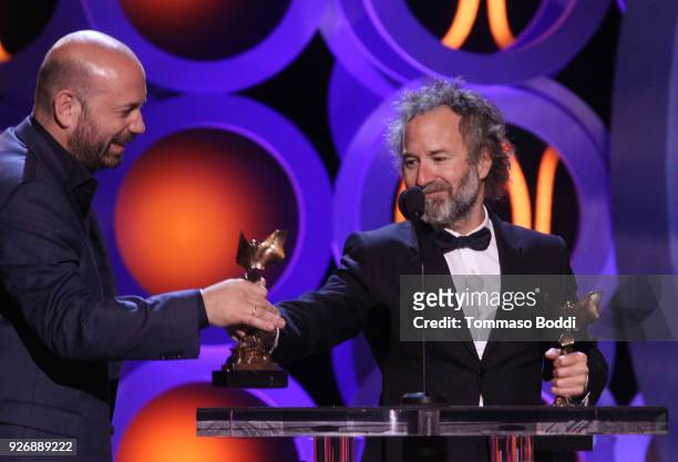 Director Antonio Mendez Esparza and producer Pedro Hernandez Santos accept the John Cassavetes Award for 'Life and Nothing More' onstage during the...