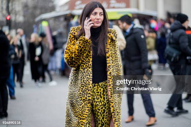 Giovanna Battaglia Engelbert wearing leopard print coat and pants is seen outside Haider Ackermann during Paris Fashion Week Womenswear Fall/Winter...