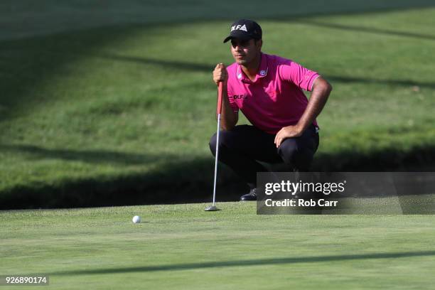 Shubhankar Sharma of India lines up a putt on the 17th green during the third round of World Golf Championships-Mexico Championship at Club de Golf...