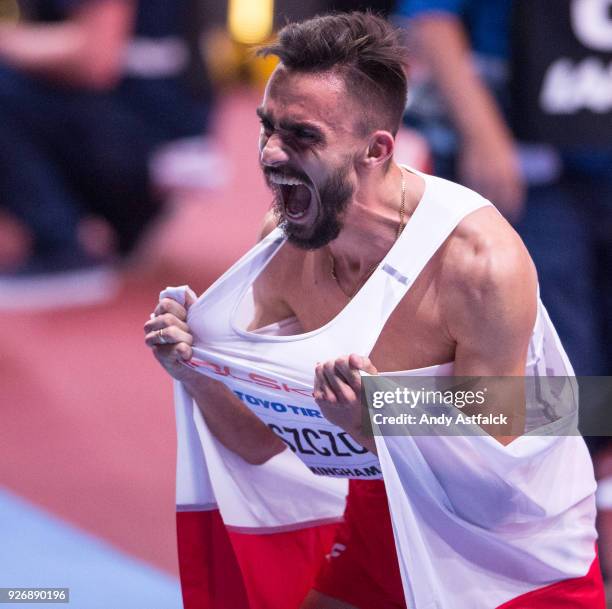 Adam Kszczot from Poland, celebrates winning the Men's 800m Final on Day 3 of the IAAF World Indoor Championships at Arena Birmingham on March 3,...