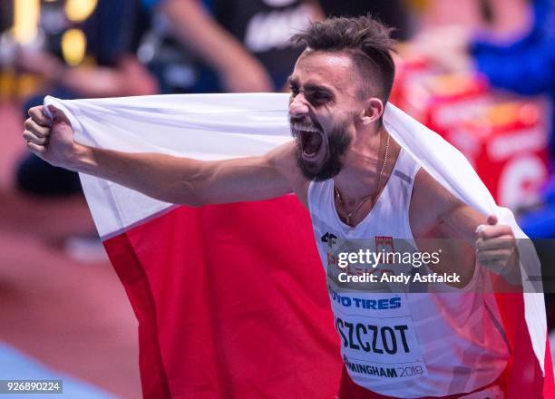 Adam Kszczot from Poland, celebrates winning the Men's 800m Final on Day 3 of the IAAF World Indoor Championships at Arena Birmingham on March 3,...