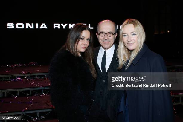 Of Sonia Rykiel, Jean-Marc Loubier , his wife Hedieh Loubier and Artistic Director at Sonia Rykiel, Julie de Libran pose after the Sonia Rykiel show...