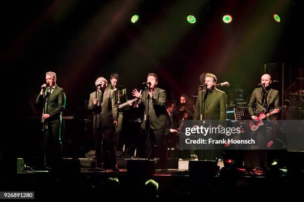 Singer Jens Sembdner, Tobias Kuenzel, Sebastian Krumbiegel, Henri Schmidt and Wolfgang Lenk of the German band Die Prinzen perform live on stage...