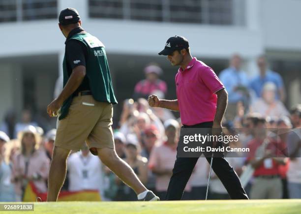 Shubhankar Sharma of India celebrates after holing a par putt on the 18th hole during the third round of the World Golf Championships-Mexico...