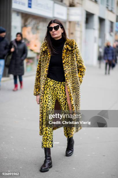 Giovanna Battaglia Engelbert wearing leopard print coat and pants is seen outside Altuzarra during Paris Fashion Week Womenswear Fall/Winter...