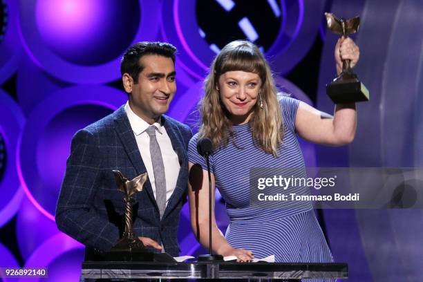 Actor/writer Kumail Nanjiani and writer Emily V. Gordon accept Best First Screenplay for 'The Big Sick' onstage during the 2018 Film Independent...