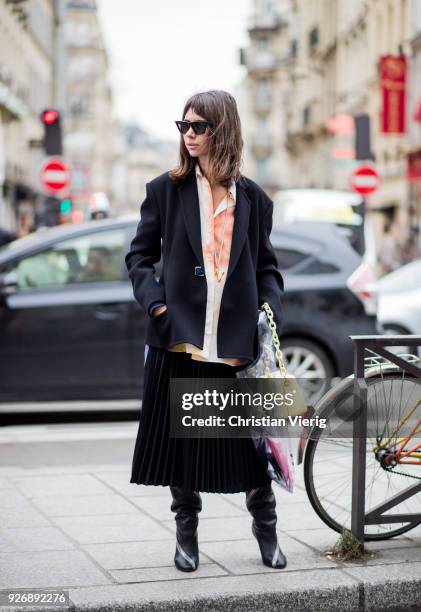 Natasha Goldenberg wearing plastic bag is seen outside Altuzarra during Paris Fashion Week Womenswear Fall/Winter 2018/2019 on March 3, 2018 in...