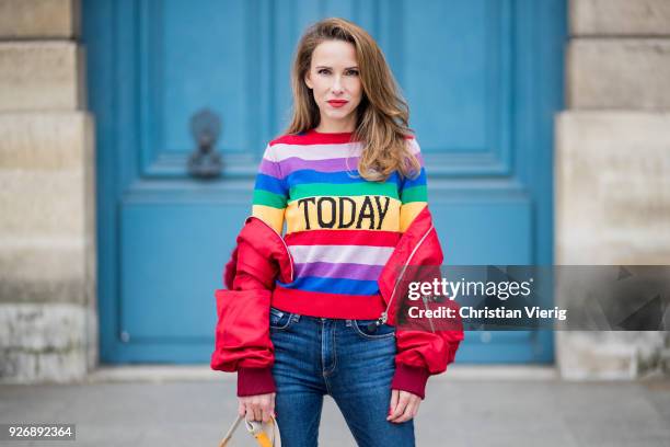 Alexandra Lapp wearing Pullover Alberta Ferretti with today print, AG Jeans denim, Bag MCM Patricia Hobo bag in striped Canvas, Aviator Sunglasses in...