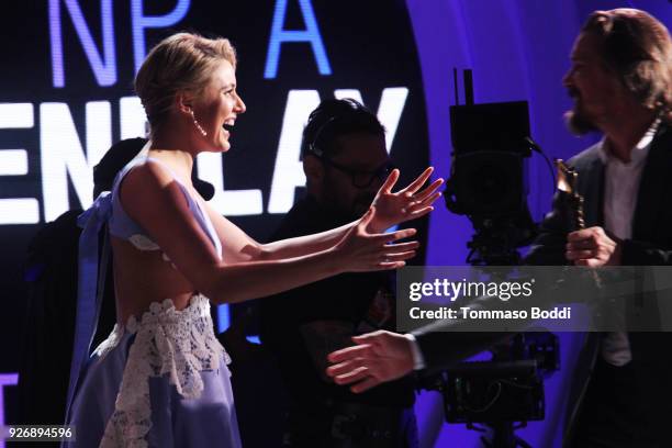 Actor/writer/director Greta Gerwig accepts Best Screenplay for 'Lady Bird' from actor Ethan Hawke onstage during the 2018 Film Independent Spirit...