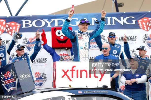 Kyle Larson, driver of the DC Solar Chevrolet, celebrates in victory lane after winning the NASCAR Xfinity Series Boyd Gaming 300 at Las Vegas Motor...