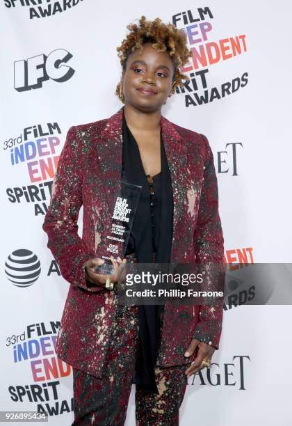 Director Dee Rees, winner of the Robert Altman Award for 'Mudbound', poses in the press room during the 2018 Film Independent Spirit Awards on March...
